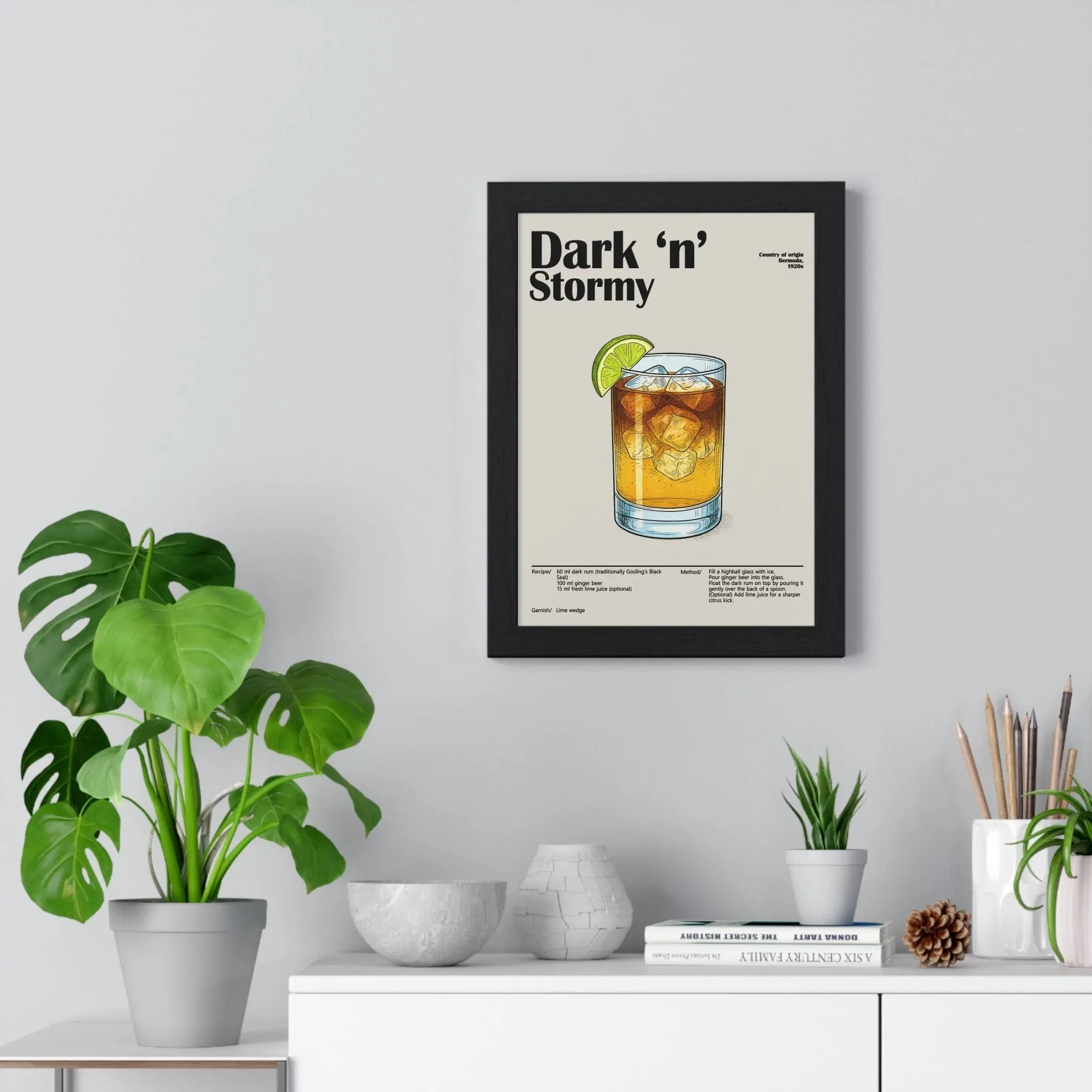 Black framed dark n stormy cocktail poster with minimalist illustration of stormy cocktail ice cubes and lime wedge