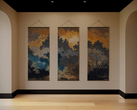 Three dark oriental forest tapestries with soft blue and warm orange blossoming trees on dark silhouettes
