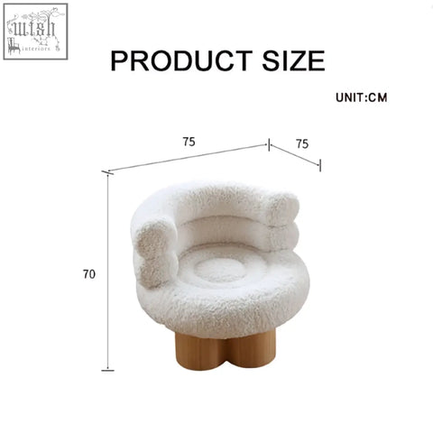 White fluffy darlene armchair with boucle fabric and wooden legs perfect for cozy living spaces