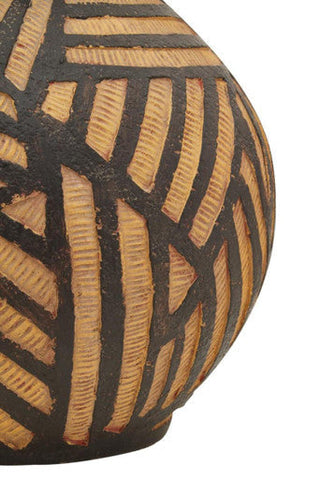 A ceramic darnell round natural vase with a rounded body and black and tan geometric stripe pattern