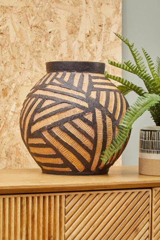 A darnell round natural ceramic vase with a textured geometric pattern in earth tones of dark brown and tan
