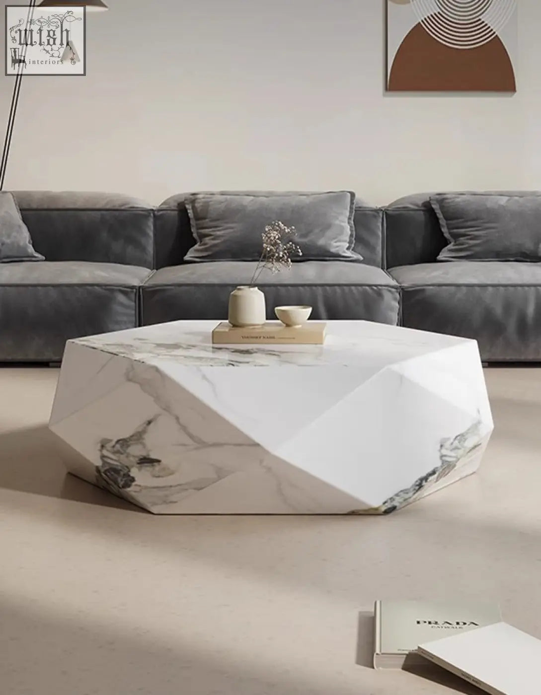 Geometric white marble darwin coffee table with gray veining and faceted edges in durable sintered stone