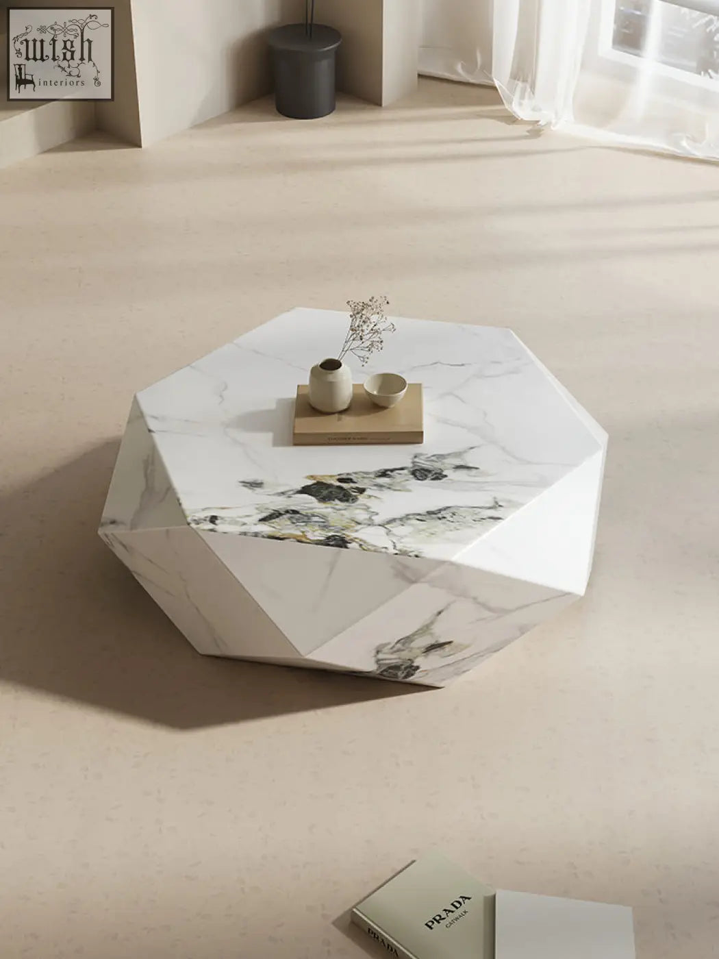 Geometric white marble darwin coffee table with faceted design and subtle gray veining in sintered stone