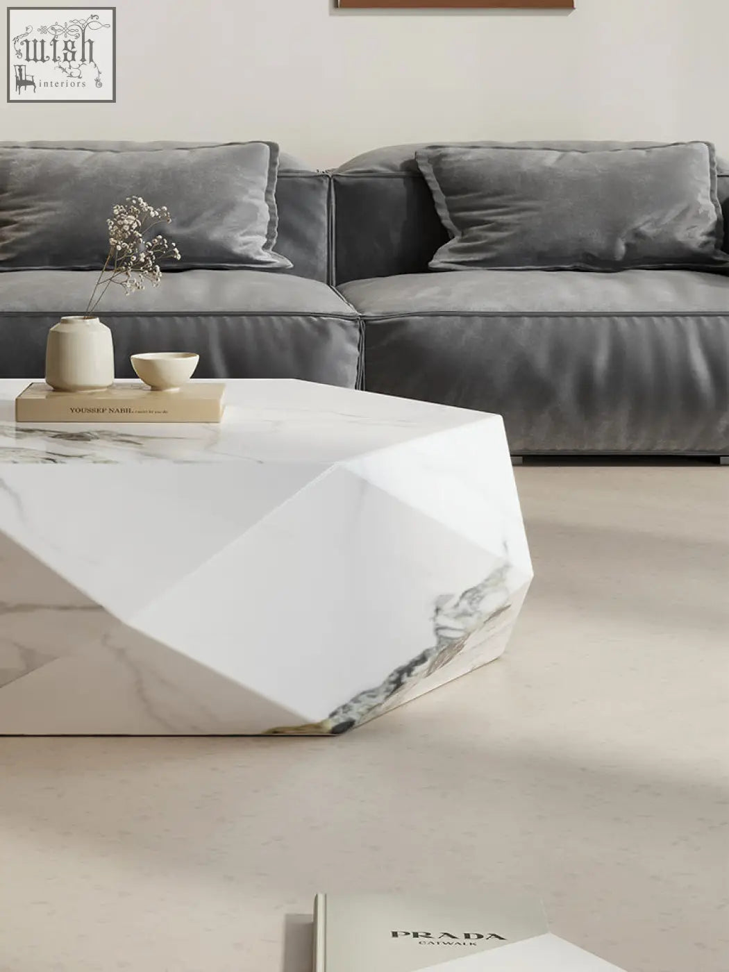 Geometric white marble darwin coffee table with sleek faceted design and subtle gray veining in sintered stone