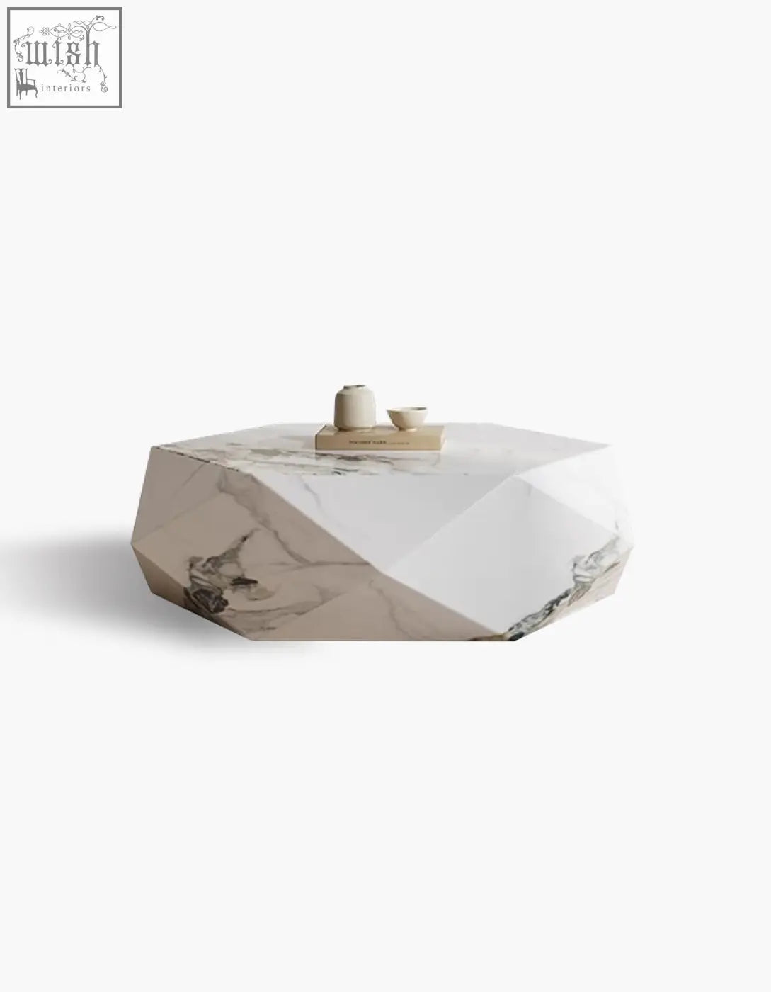 A sleek darwin coffee table with a white marble sintered stone surface featuring subtle gray veining and angular facets