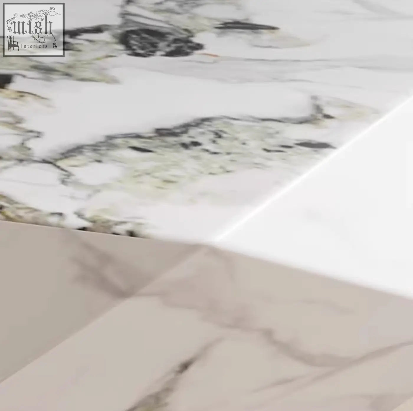 White marble-patterned sintered stone darwin coffee table with subtle gray and black veining on countertop surface