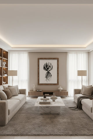 A minimalist black and white botanical fine art print david ballam aloe 06 in a rustic wooden frame above a coffee table