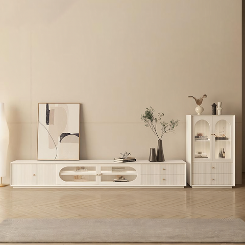 White minimalist tv console with vertical ribbed detailing and glass storage in davinia living room set