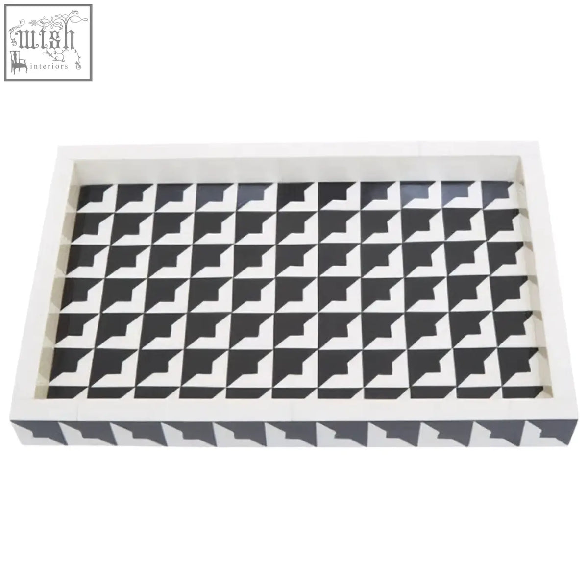 White rectangular davino black and white tray with raised edges and geometric interlocking triangle pattern