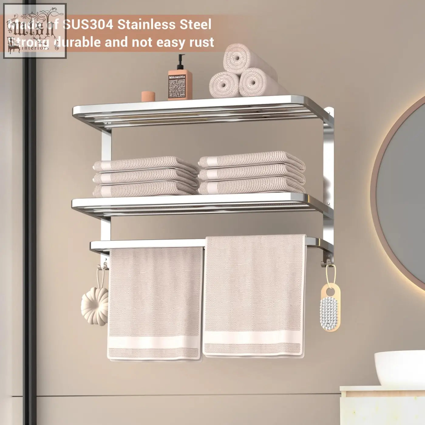 Shiny chrome finished sus304 stainless steel towel shelf with three tiers holding beige towels and soap dispenser