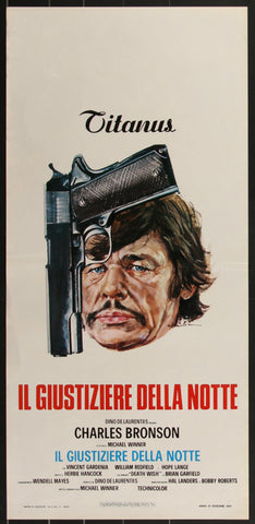 Black handgun with textured grip and silver barrel featured on death wish 1974 original italian locandina movie poster