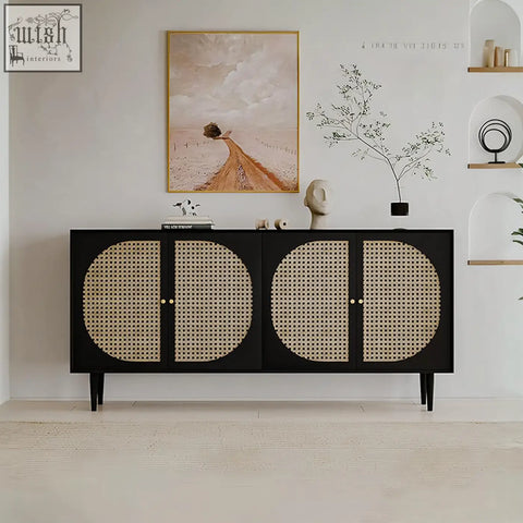 Black debby rattan sideboard with circular cane panel doors and gold-toned hardware for stylish storage