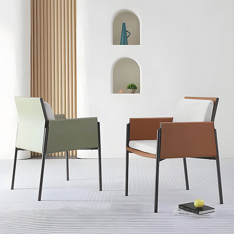 Modern decker dining chair with armrests in olive green and brown leather with white cushions and sleek black metal frame