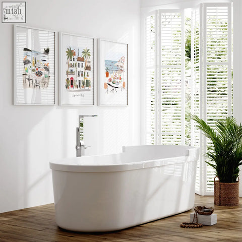 White freestanding bathtub with sleek modern design and glossy finish for bathroom decor with sotto il sole wall art prints