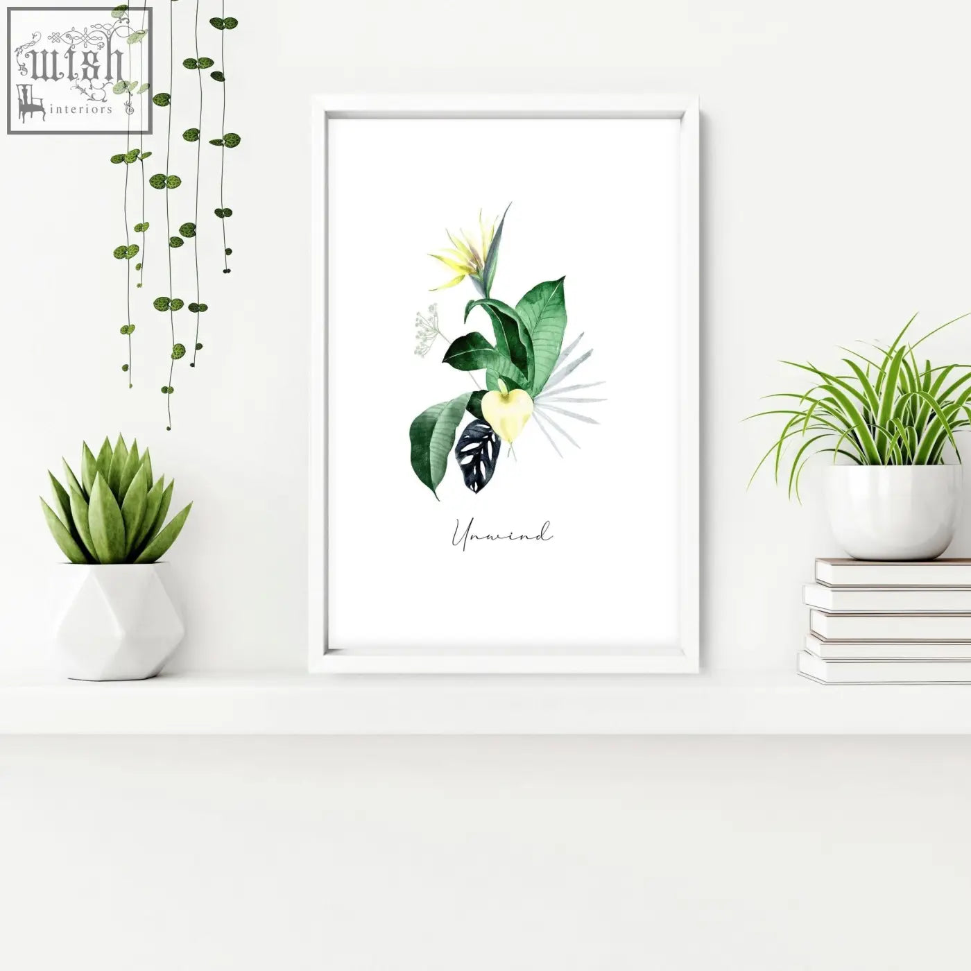 White framed botanical wall art with green leaves yellow flower and unwind script perfect for bathroom walls tropical oasis