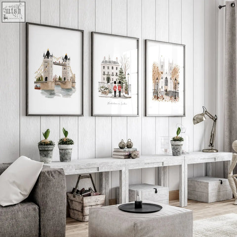 Three framed watercolor prints of london landmarks in pastel tones as decorative wall hangings for living room decor