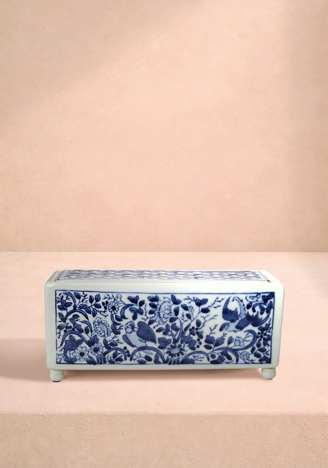 A rectangular porcelain delft tulipiere vase with blue and white floral and bird motifs and decorative lattice lid