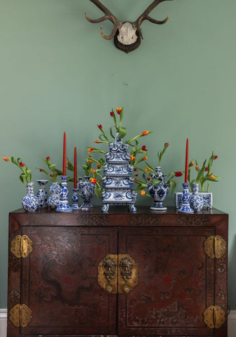 Blue and white hand painted ceramic delft tulipiere tall vase with intricate floral patterns and tiered design