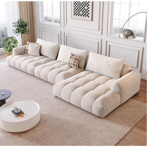 Beige tufted cream delilah violet two seater sofa with plush segmented cushions and matching throw pillows four seater sofa