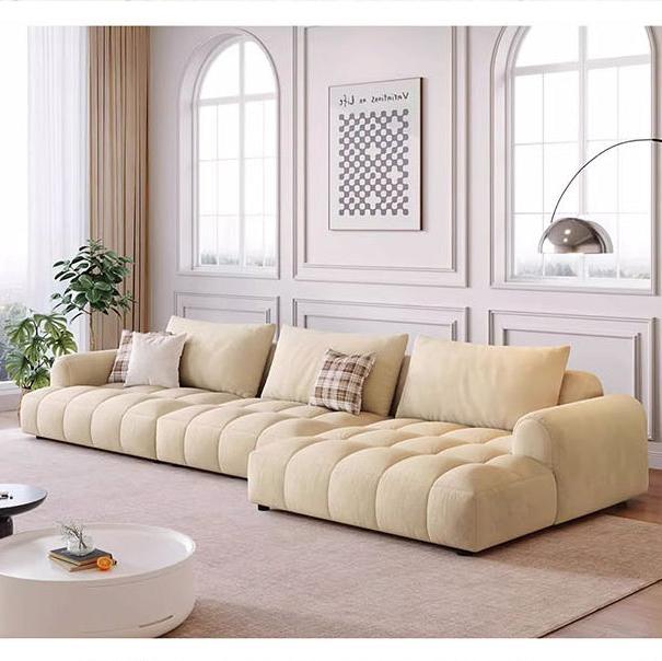 Cream-colored delilah violet two seater sofa with tufted plush cushions and modern design for four seater sofa option