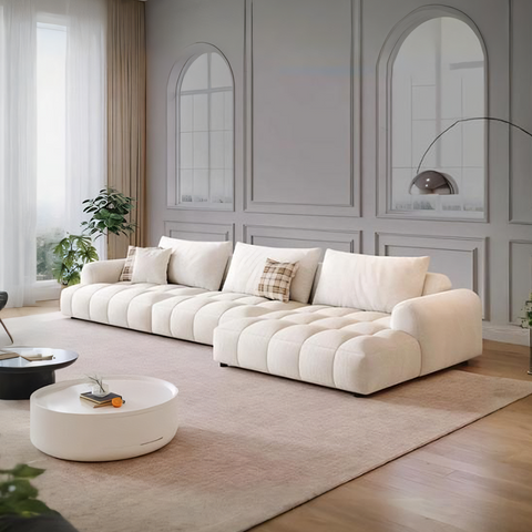 Cream delilah violet two seater sectional sofa with plush tufted cushions and modern minimalist design four seater sofa