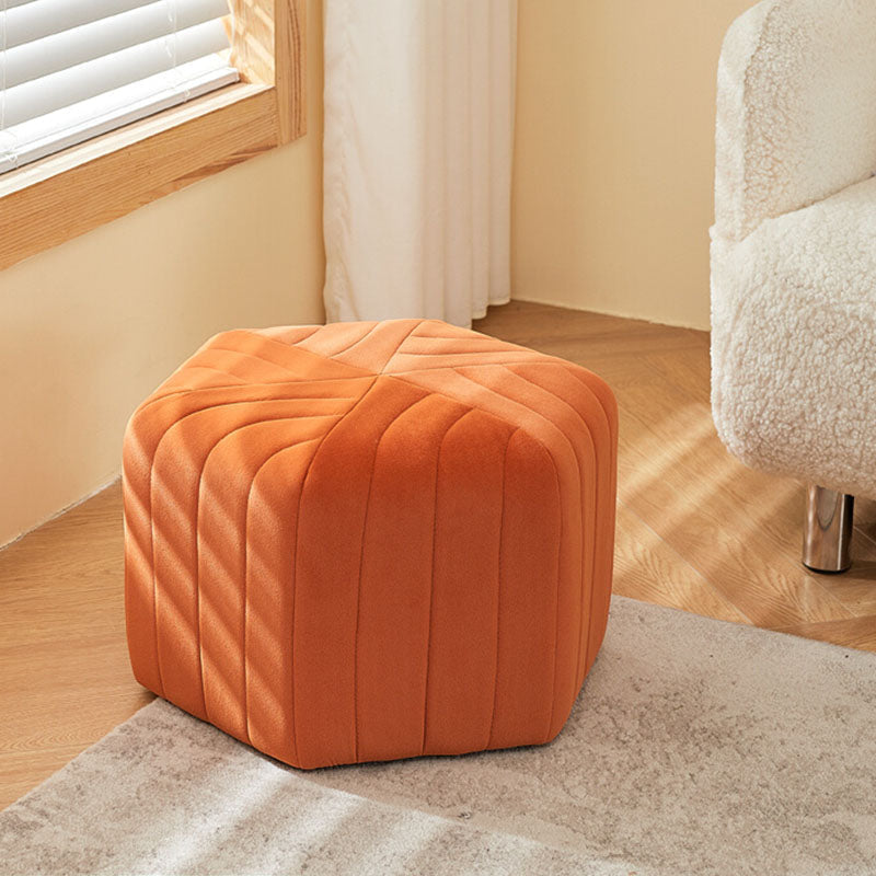 Orange velvet della footstool hexagonal ottoman with vertical stitched seams and soft velvet finish