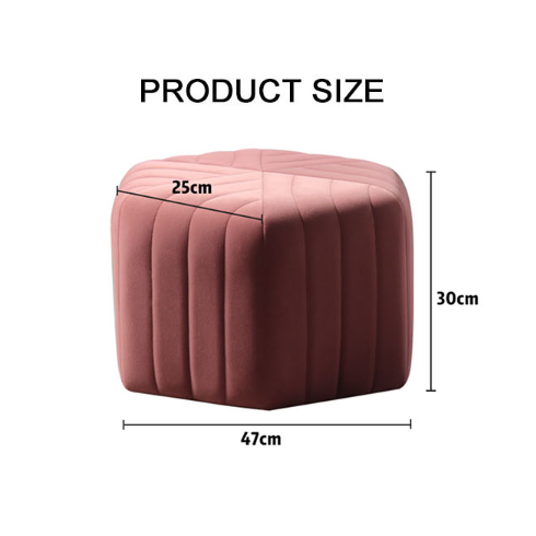 A plush rose-colored velvet cube ottoman with vertical stitched seams for cozy seating called della footstool