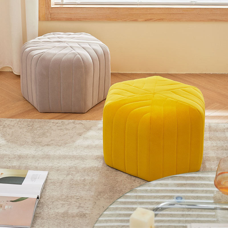 Bright yellow velvet della footstool ottoman with quilted hexagonal design perfect for living room seating