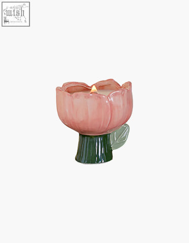 Pink ceramic tulip-shaped delphine scented candle holder with green stem and leaf accent shipping cost info available