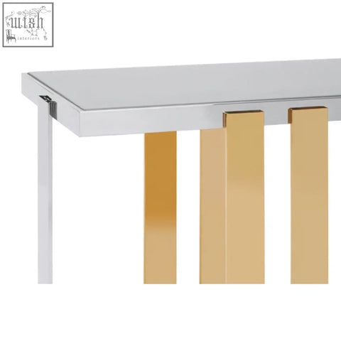 Modern demas console table with sleek white top and vertical gold toned metal legs for stylish living spaces