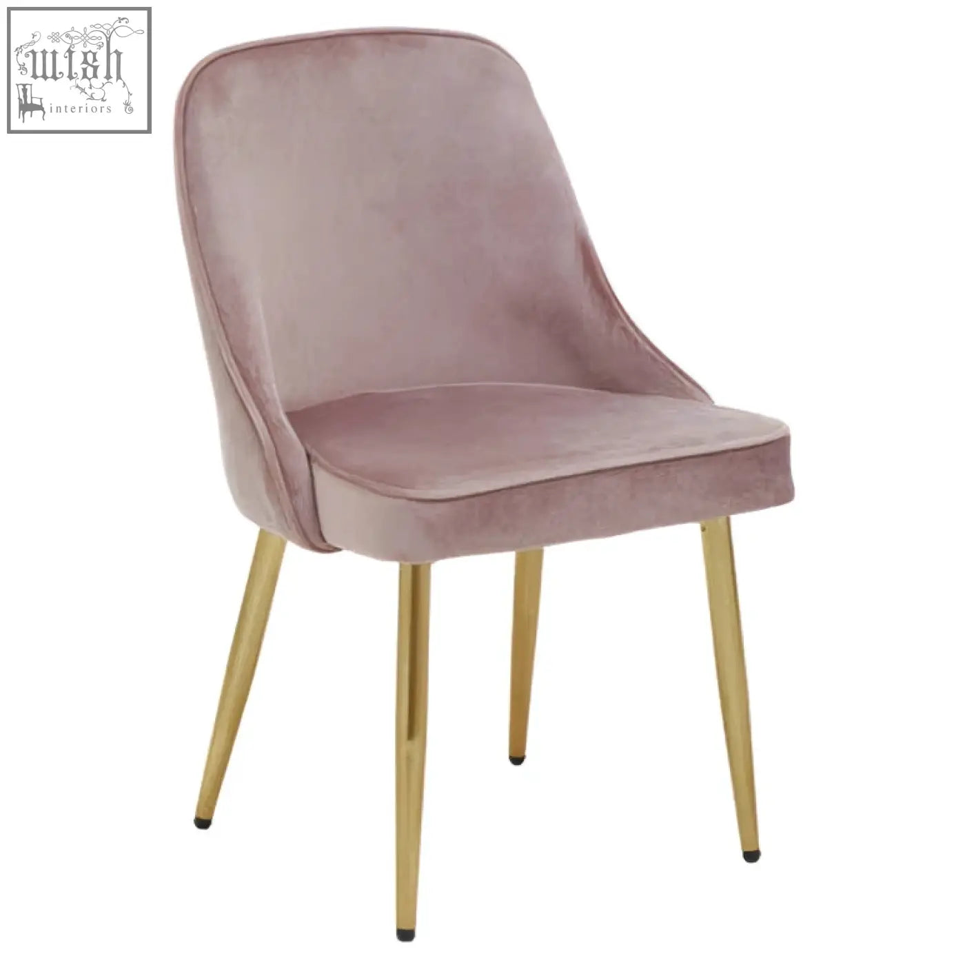 A demi dusky pink velvet dining chair with soft pink velvet upholstery and slender gold metal legs