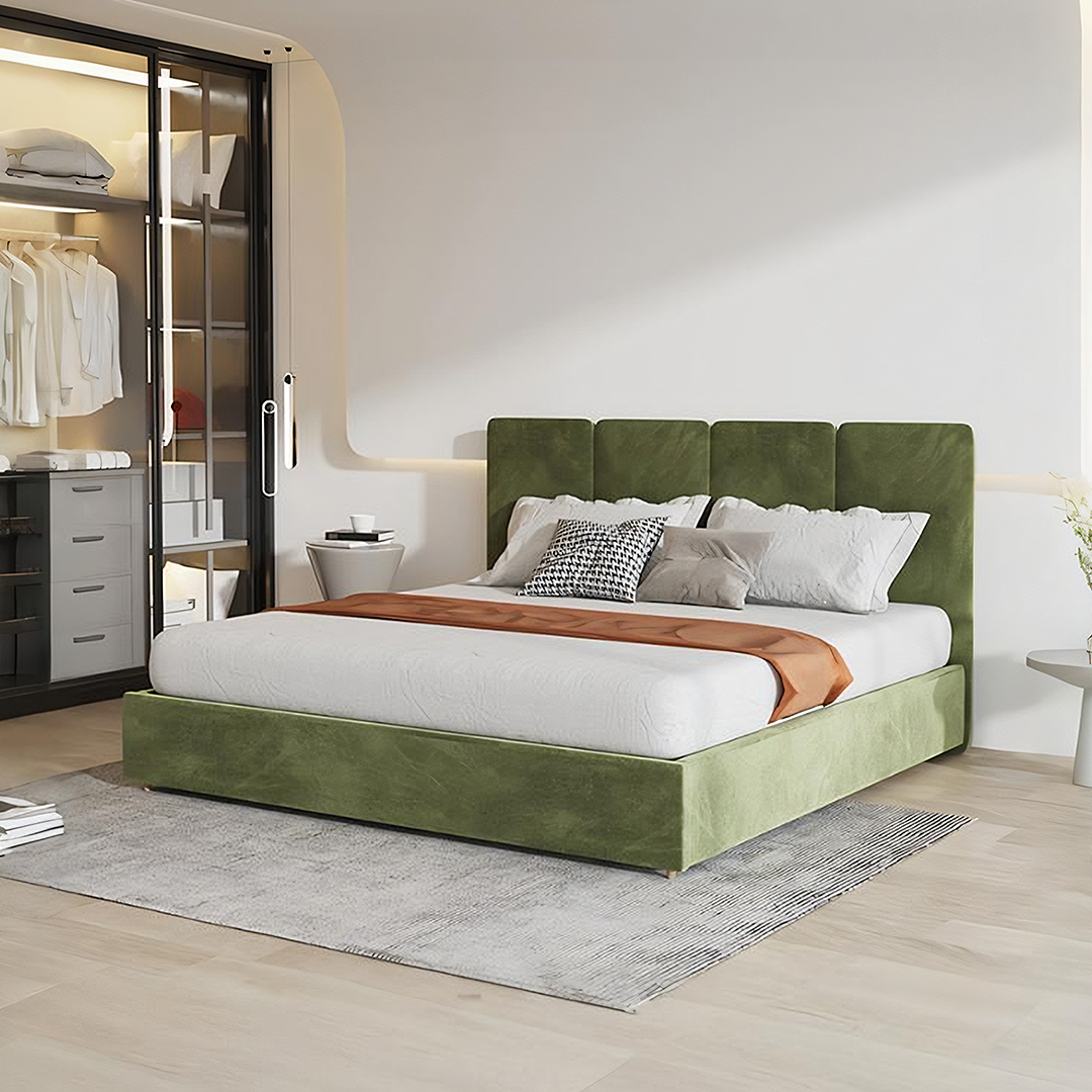 Denice king size bed with plush olive green velvet headboard and base, white bedding, and orange throw in king size bed style