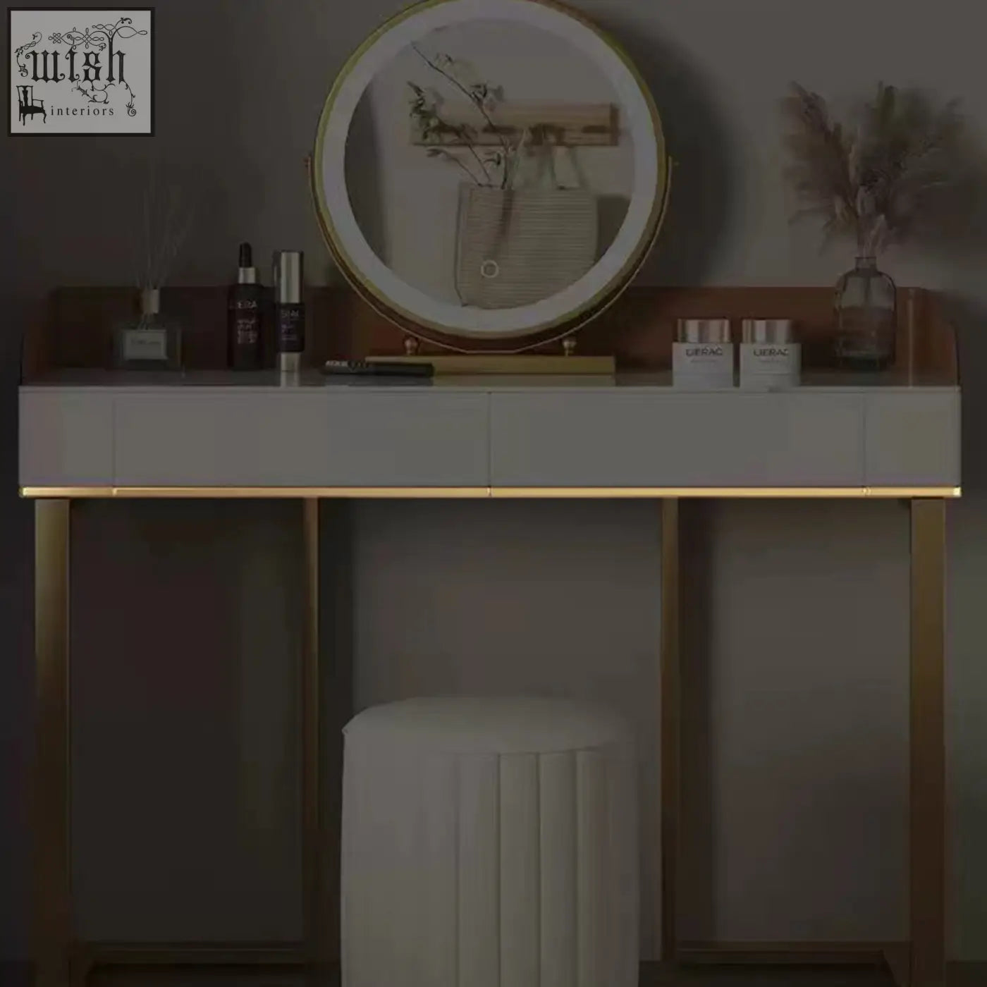 Gold-framed circular vanity mirror with integrated led lighting on denver dressing table for stylish makeup setup