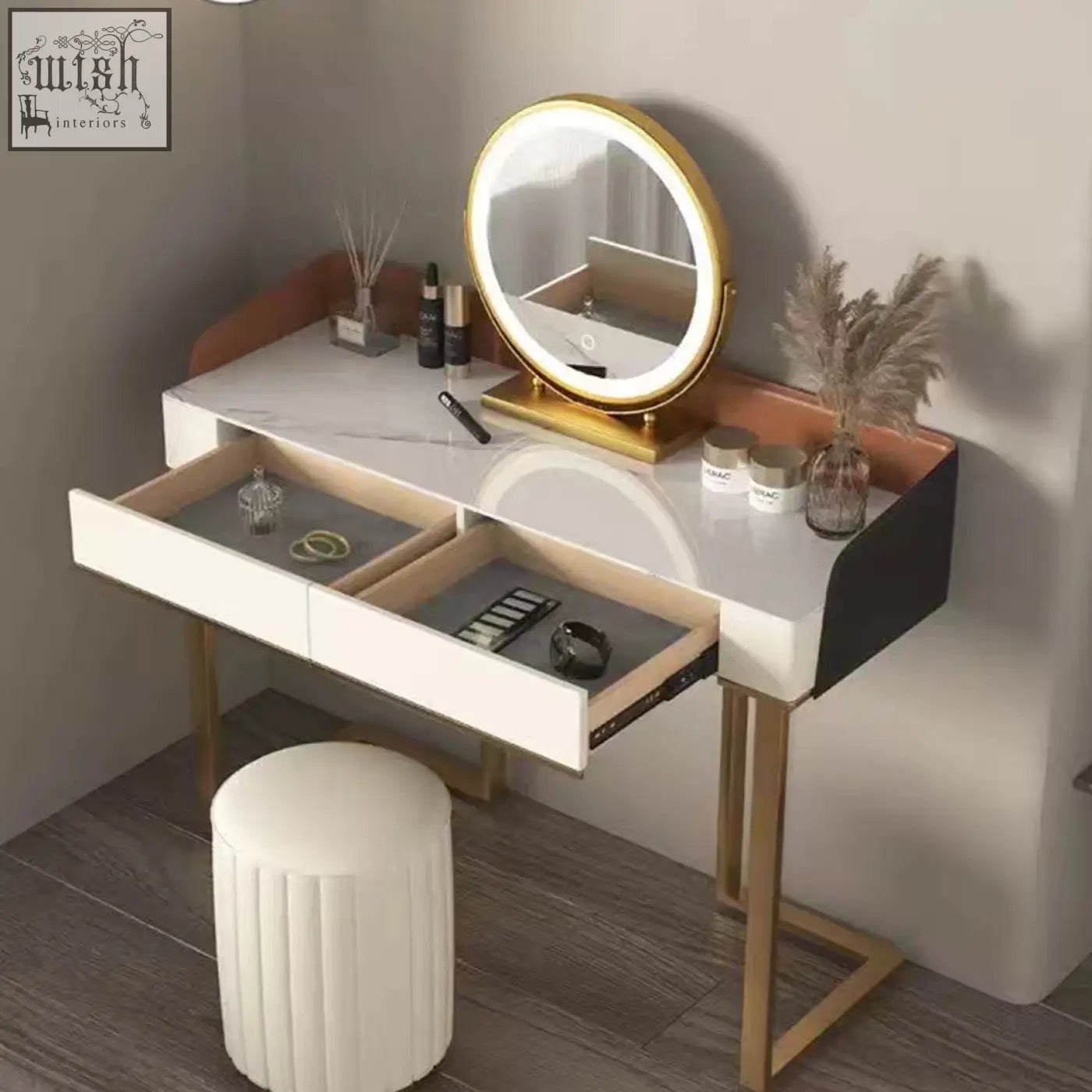 Modern denver dressing table with white marble top gold-tone legs and open drawers showing organized jewelry storage