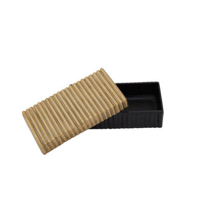Black trinket box with a small gold textured ribbed lid perfect for storing jewelry and keepsakes