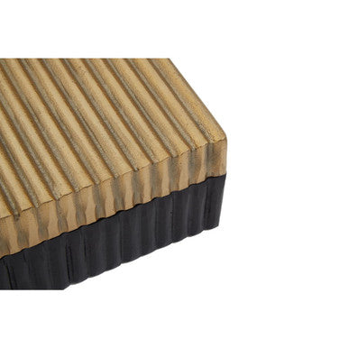 Small gold and black trinket box showing golden corrugated plastic deck tile with black rubber backing on the back side