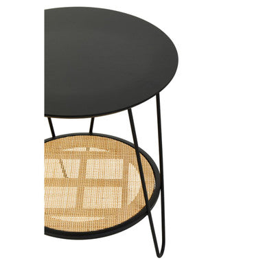 Black metal side table with hairpin legs featuring depok rattan round top and woven cane lower shelf