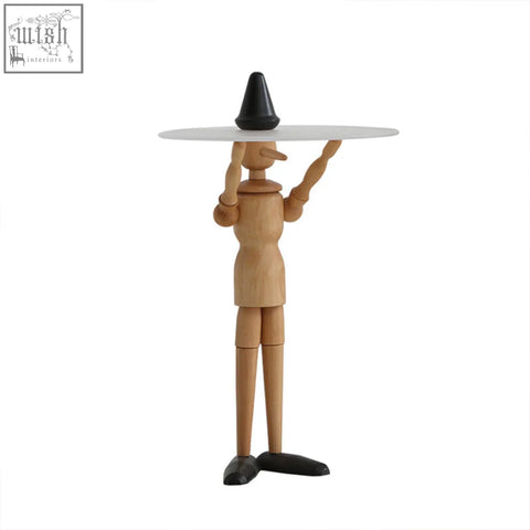 Solid wood derby pinocchio puppet side table with black conical hat holding a white circular tray