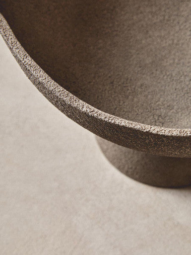 A matte gray ceramic pedestal bowl with textured grey surface and rounded edges perfect for small servings