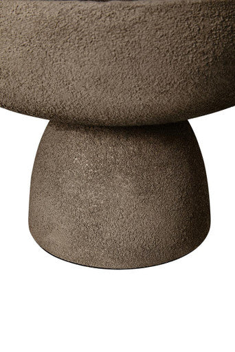A matte grey textured ceramic pedestal bowl with a wide bowl and sturdy base perfect for indoor plants