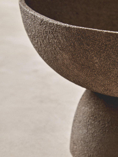 Earthenware small textured grey pedestal bowl with rough surface and muted brown color perfect for serving