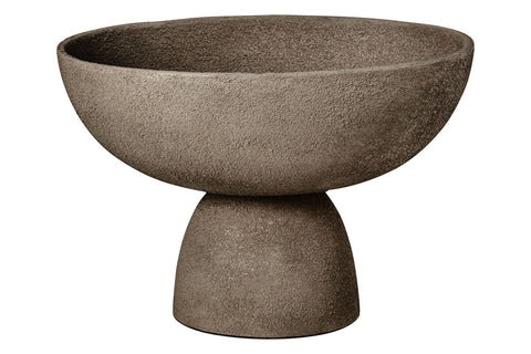A matte gray textured grey pedestal bowl with a wide rim and sturdy stone base perfect for decor or serving
