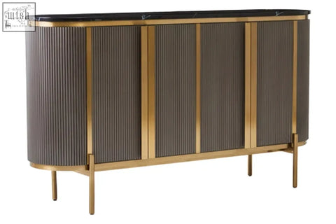 Modern grey four door sideboard with black marble top vertical ribbed panels and slim gold legs