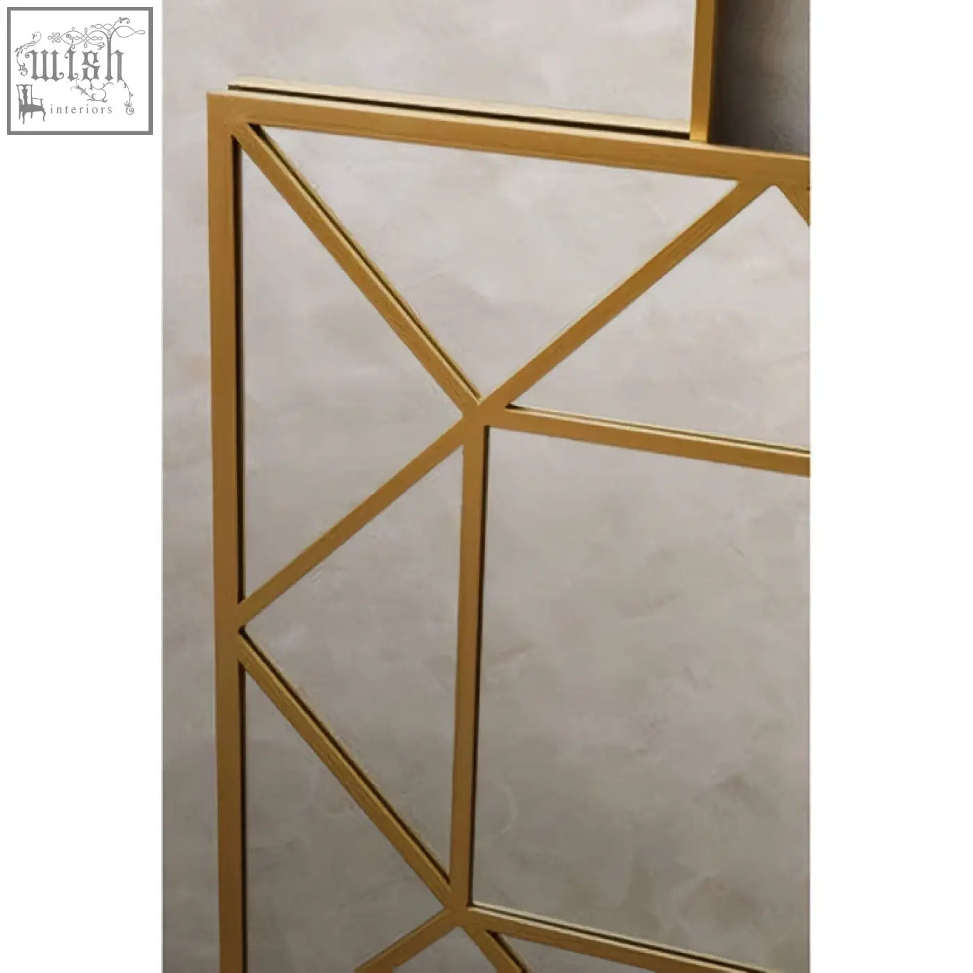 Descartes gold frame wall mirror with a modern angular design and gold frame perfect as a stylish wall mirror