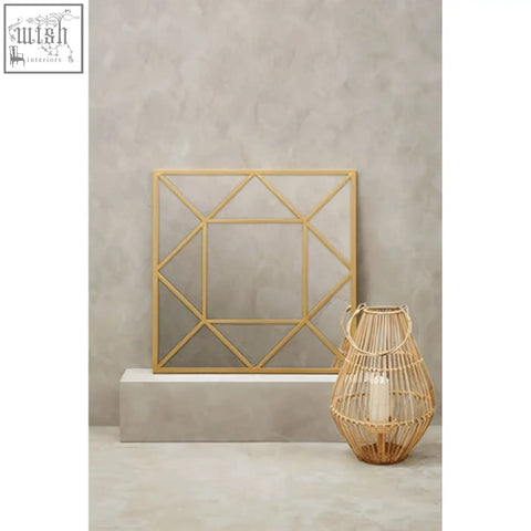 Descartes gold frame wall mirror with a modern angular design and geometric gold frame for stylish decor