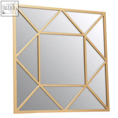 Descartes gold frame wall mirror with a modern gold frame and geometric angular design for stylish wall decor