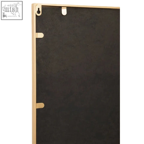Backside of descartes gold frame wall mirror showing gold-toned metal frame with black backing and mounting hardware