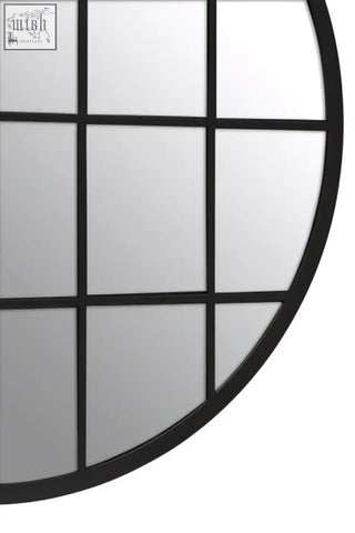 Black descartes round metal wall mirror with grid of square panes and sleek modern frame for stylish decor