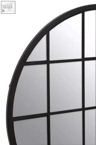 Black framed descartes round metal wall mirror with circular shape and rectangular pane grid design