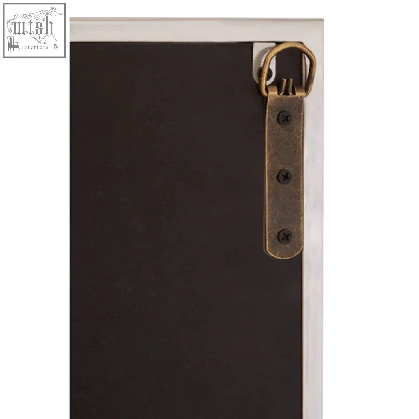 Dark brown leather strap with brass buckle and rivets attached to the corner of descrates square window pane wall mirror